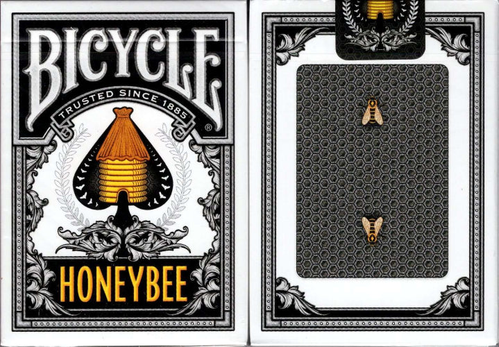 Bicycle Honeybee playing cards with black and gold design on a white background