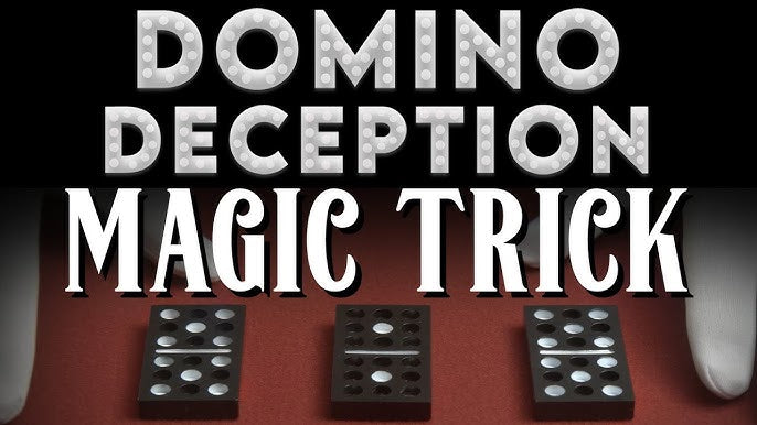 Dominoes on a red surface with text 'Domino Deception Magic Trick' on a black background