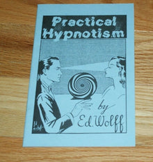 Book cover of 'Practical Hypnotism' by Ed. Wolff on a wooden surface