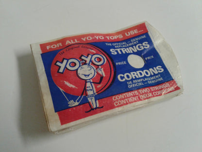 Box of YO-YO strings with a cartoon character on a white background