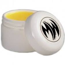 White jar with a black logo on a white background