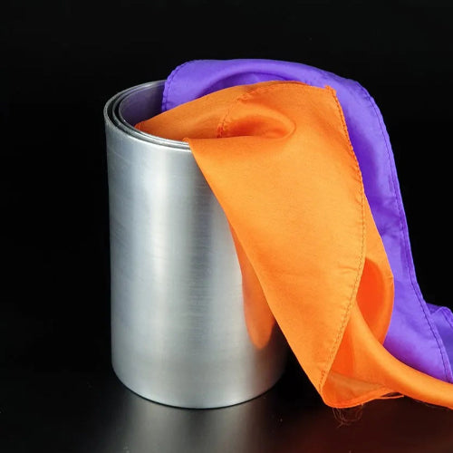 Silver container with a purple and orange cloth on a black background