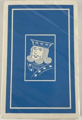 Blue playing card deck with a decorative face design on a white background