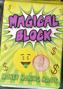Box of 'Magical Block' with dollar signs and a penny on a yellow and green background