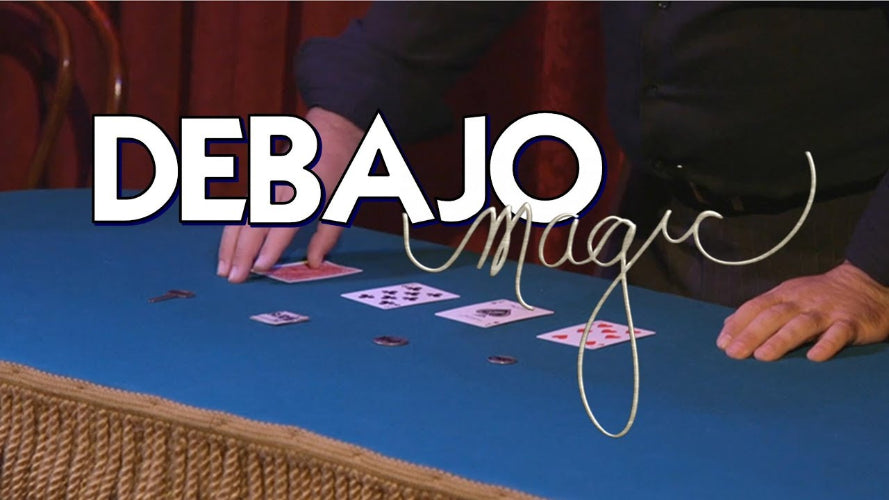 Close-up of a card trick with 'Debajo Magic' branding.