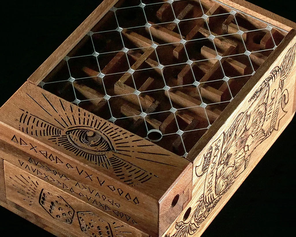 Wooden puzzle box with geometric patterns and engravings on a black background