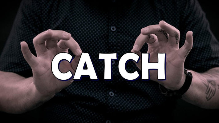 Text 'CATCH' displayed between two hands against a dark background
