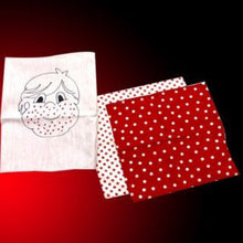 Two fabric swatches with polka dot patterns on a dark background