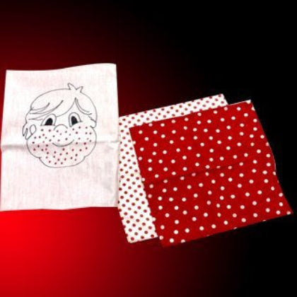 Two fabric swatches with polka dot patterns on a dark background