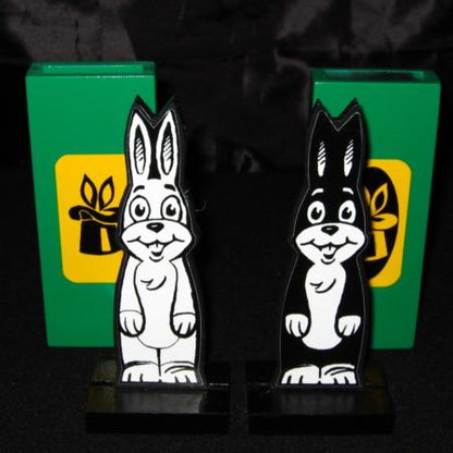 Two cartoon rabbit figures on stands with green bases featuring yellow logos.