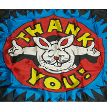 Decorative pillow with cartoon rabbit and 'Thank You' text on a colorful background