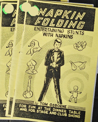 Yellow leaflets with text and illustrations on a textured surface