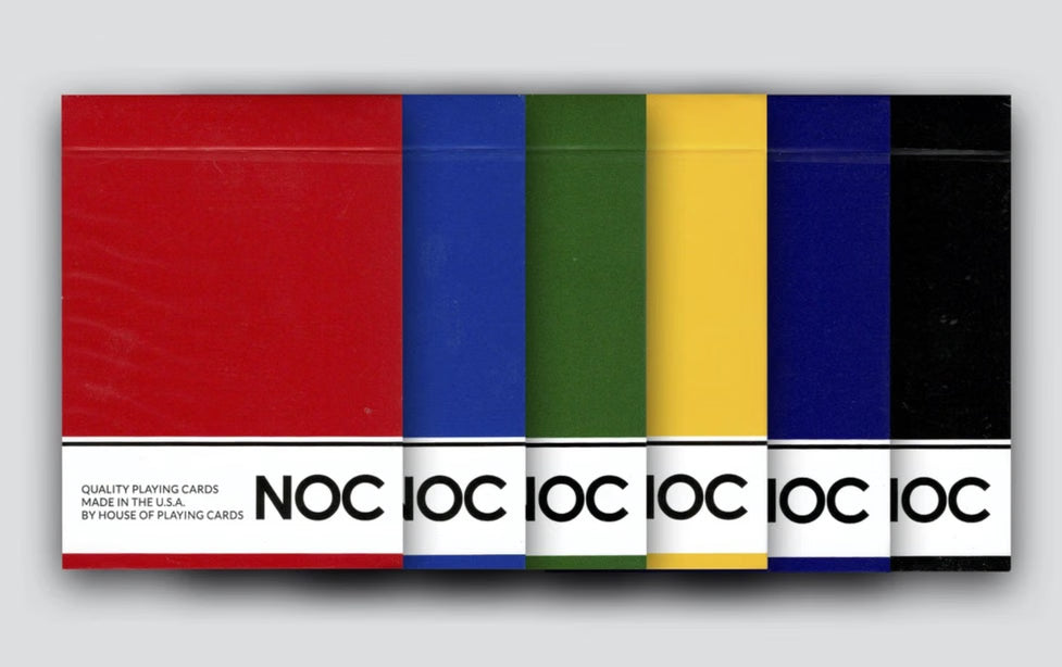 Set of colorful playing card boxes with 'NOC' branding on a gray background