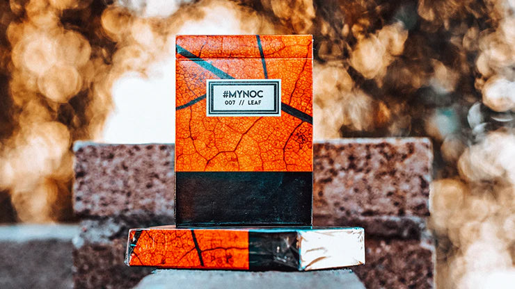 Packaged product with a leaf pattern on a blurred natural background