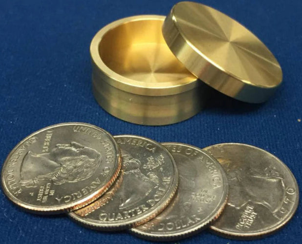 Gold coin holder with U.S. coins on a blue background