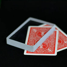 Playing cards with a black back and red front on a black background