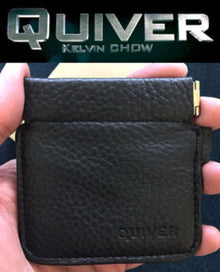 Black leather wallet held in a hand with 'Quiver' branding.