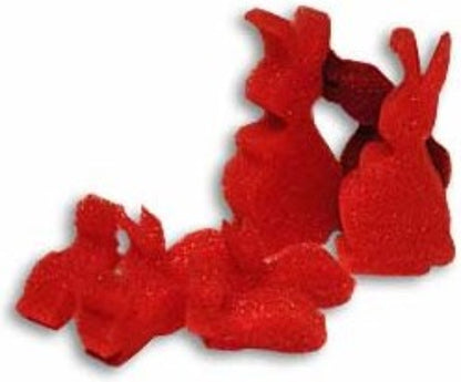 Red plush bunny toys on a white background