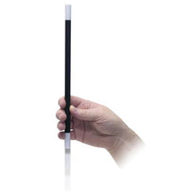 Hand holding a black and white striped rod against a white background
