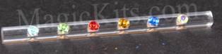 Set of colorful gemstones on a clear stick with 'MagicKits.com' branding.
