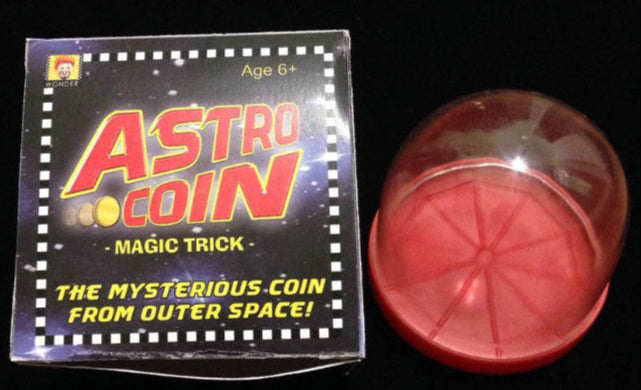Astro Coin magic trick packaging with red lid on a black surface