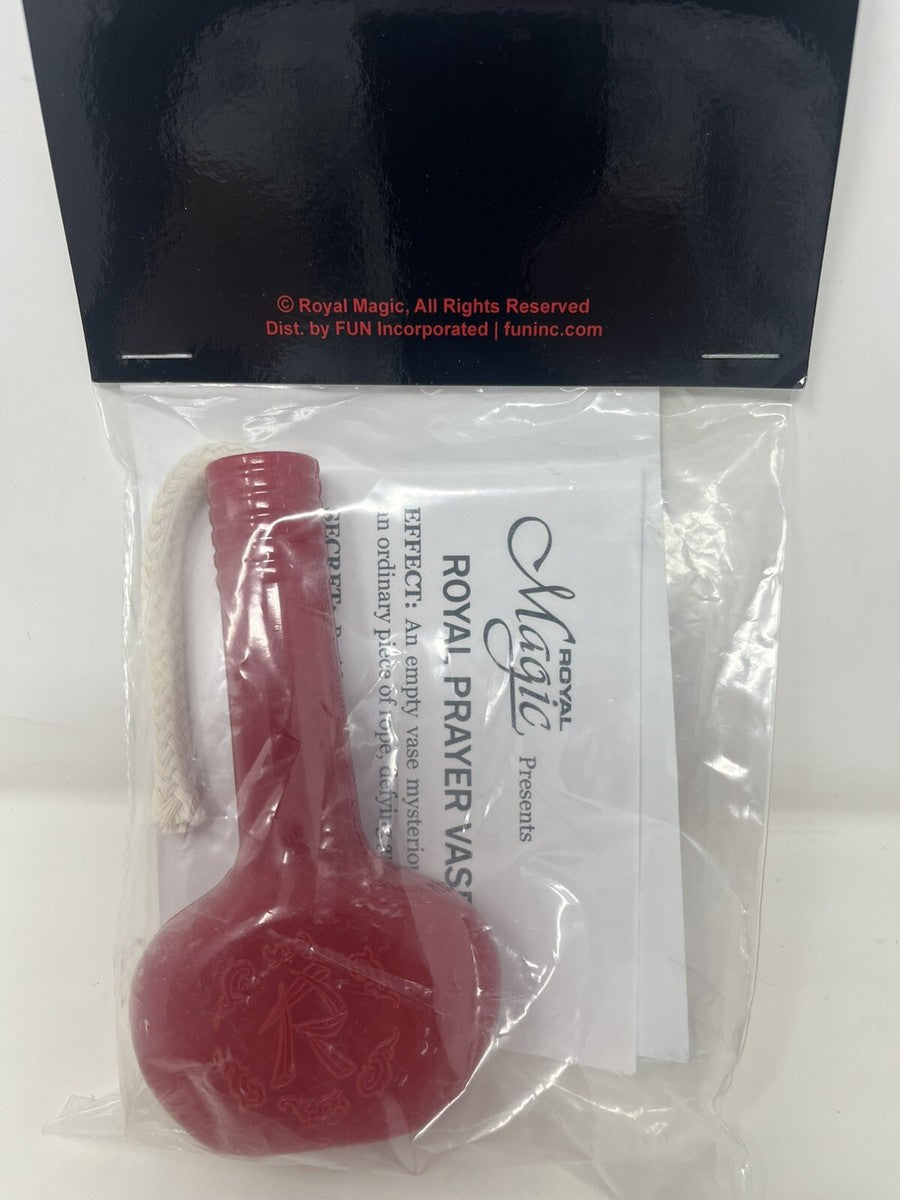 Red prayer vase in clear packaging with 'Royal Magic' branding.