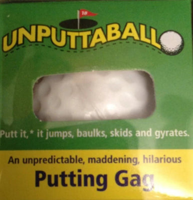Unputtaball packaging with a golf ball inside on a dark surface
