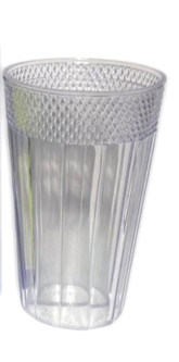 Clear glass with decorative rim next to its packaging box on a white background