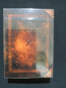 Ghost Note card packaging with a dark background