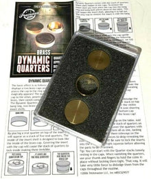 Brass dynamic quarters in a display case on a magazine background