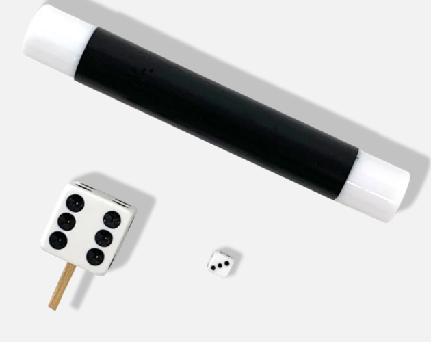 Black and silver dice cup with dice on a white background