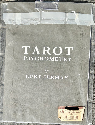 Book titled 'Tarot Psychometry by Luke Jermay' in a clear plastic sleeve.