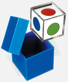 Blue box with a clear cube containing colored dots on a white background
